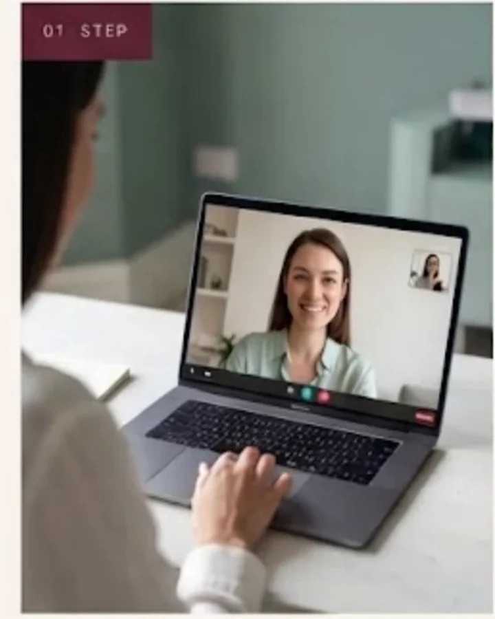 A woman on a private video call with a clinician